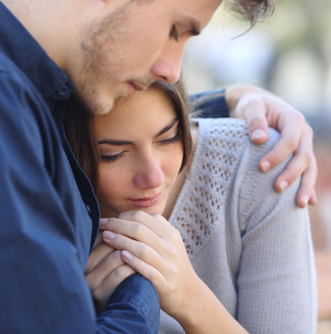 Man Comforting a Woman